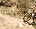 Bo Pihl enjoying a short descent on his single speed mountain bike. by Karen Jarchow